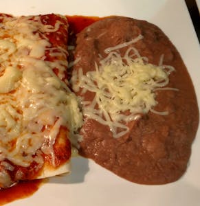 Order J. One Burrito & Rice or Beans food online from La Tolteca store, Williamsburg on bringmethat.com