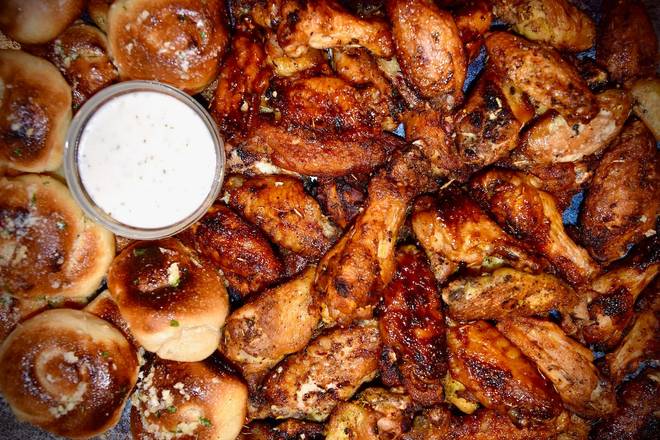 Order 50 Wings, 12 Garlic Knots + 2 Large Dips food online from The Roasted Wing store, Blue Bell on bringmethat.com