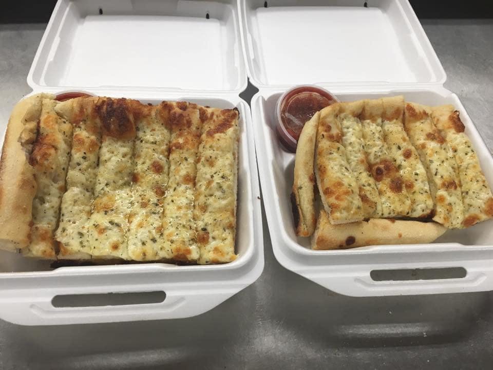 Order Garlic Bread with Cheese - Small food online from Ideal Pizza store, Blackstone on bringmethat.com