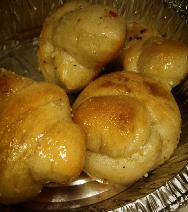 Order Garlic Knots - 4 Pieces food online from Mannino's 3 store, Hamilton Square on bringmethat.com