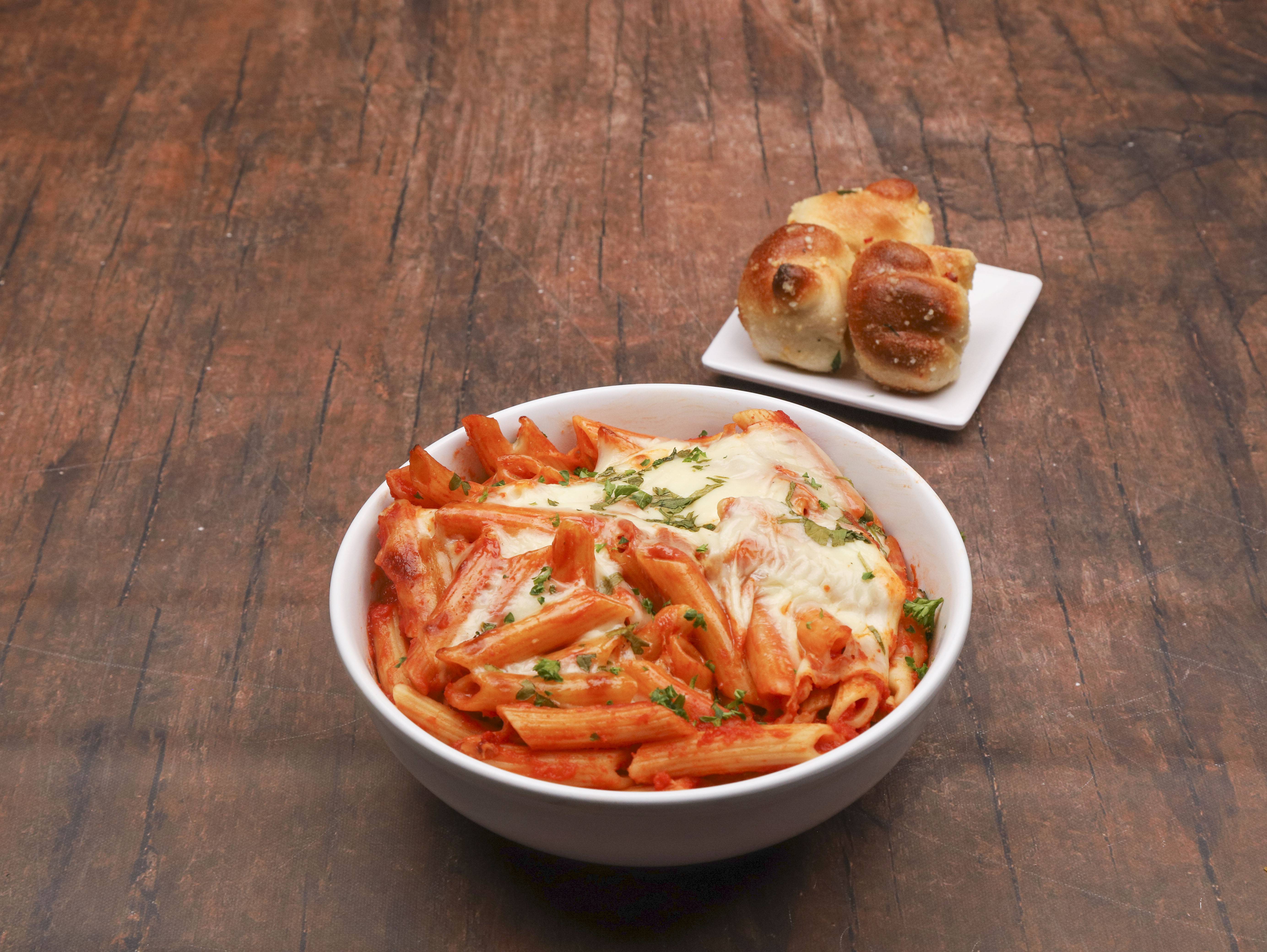 Order Baked Ziti  food online from Carollos Little Italy store, Moorestown on bringmethat.com