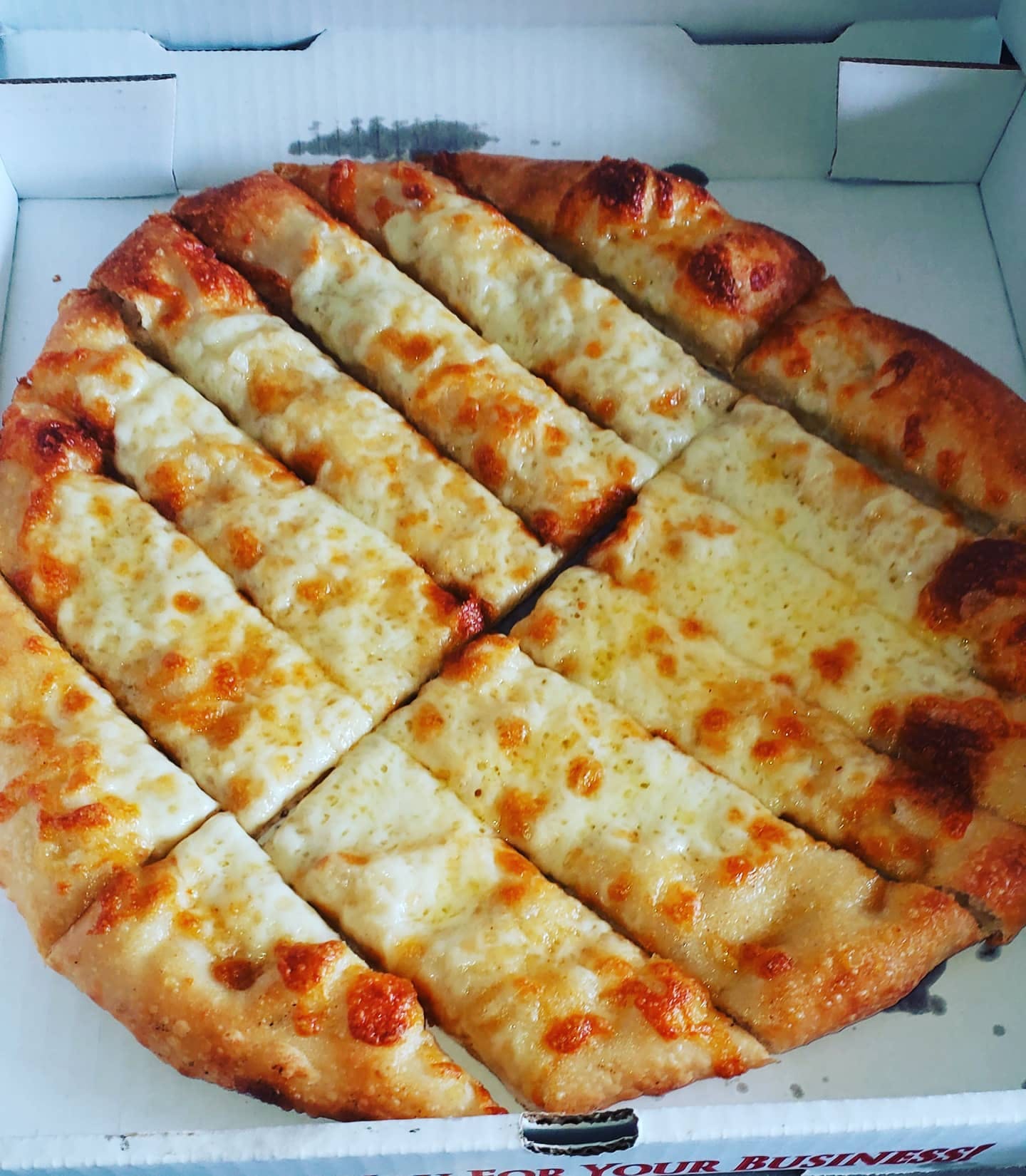 Order Mangia Garlic Cheese Bread - 12'' food online from Mangia Pizza and Catering store, Westland on bringmethat.com