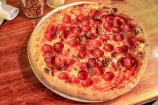 Order Meat Lover's Pizza food online from Clarke's (wrigley) store, Chicago on bringmethat.com