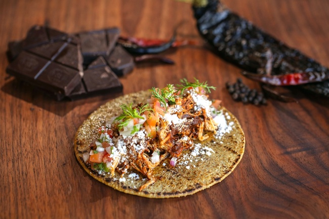 Order Chicken Mole Taco food online from Oaxaca Taqueria store, New York on bringmethat.com