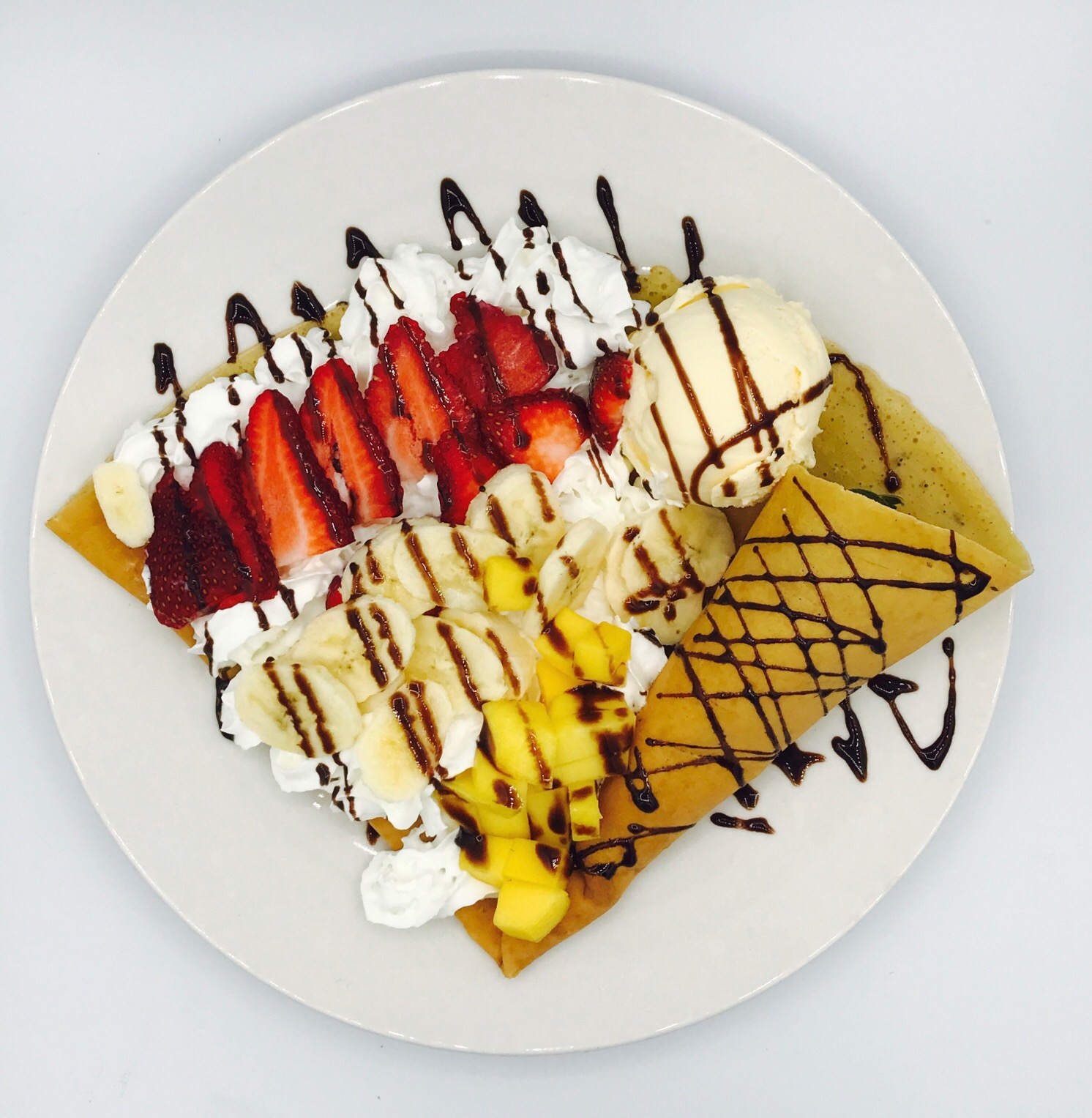 Order #C4 Mixed Fruit, Chocolate Sauce, and Whipped Cream Crepe food online from Sweet Mango Dessert Cafe store, San Francisco on bringmethat.com