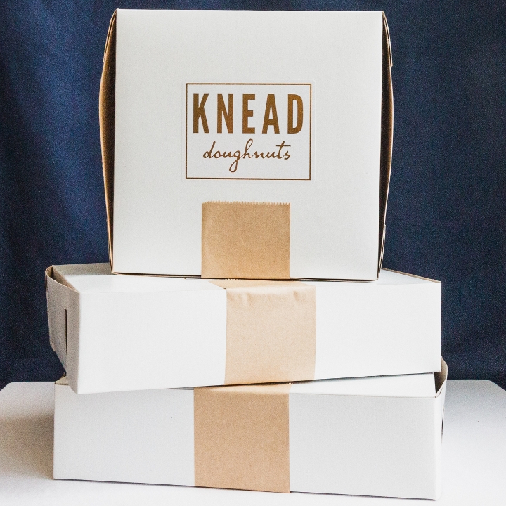 Order 18 Assorted food online from Knead Doughnuts store, Providence on bringmethat.com