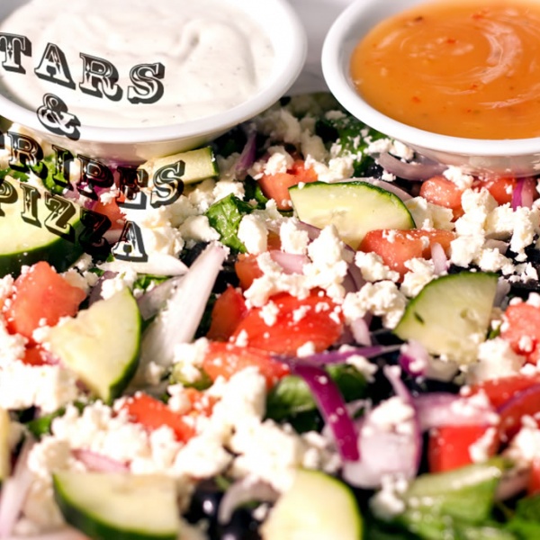 Order Greek Salad food online from Stars & Stripes Pizza store, Oklahoma City on bringmethat.com