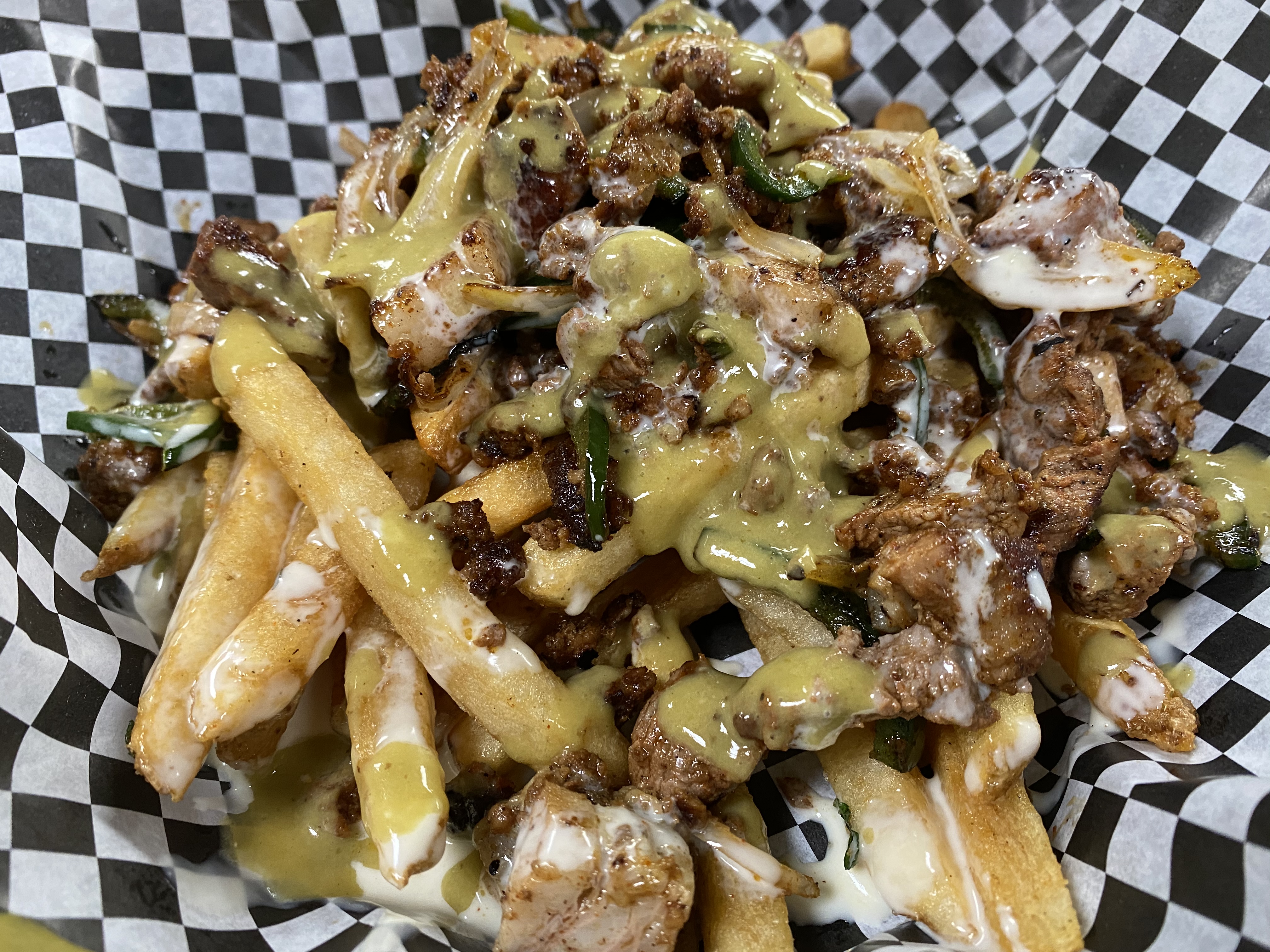 Order Electric Fries food online from Taphouse Kitchen store, Phoenix on bringmethat.com