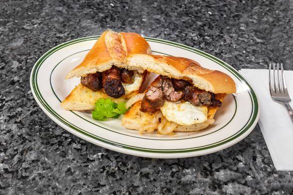 Order Sandwich Dominicano - 2 Huevos, Queso ＆ Longaniza food online from La barca restaurant store, New York on bringmethat.com
