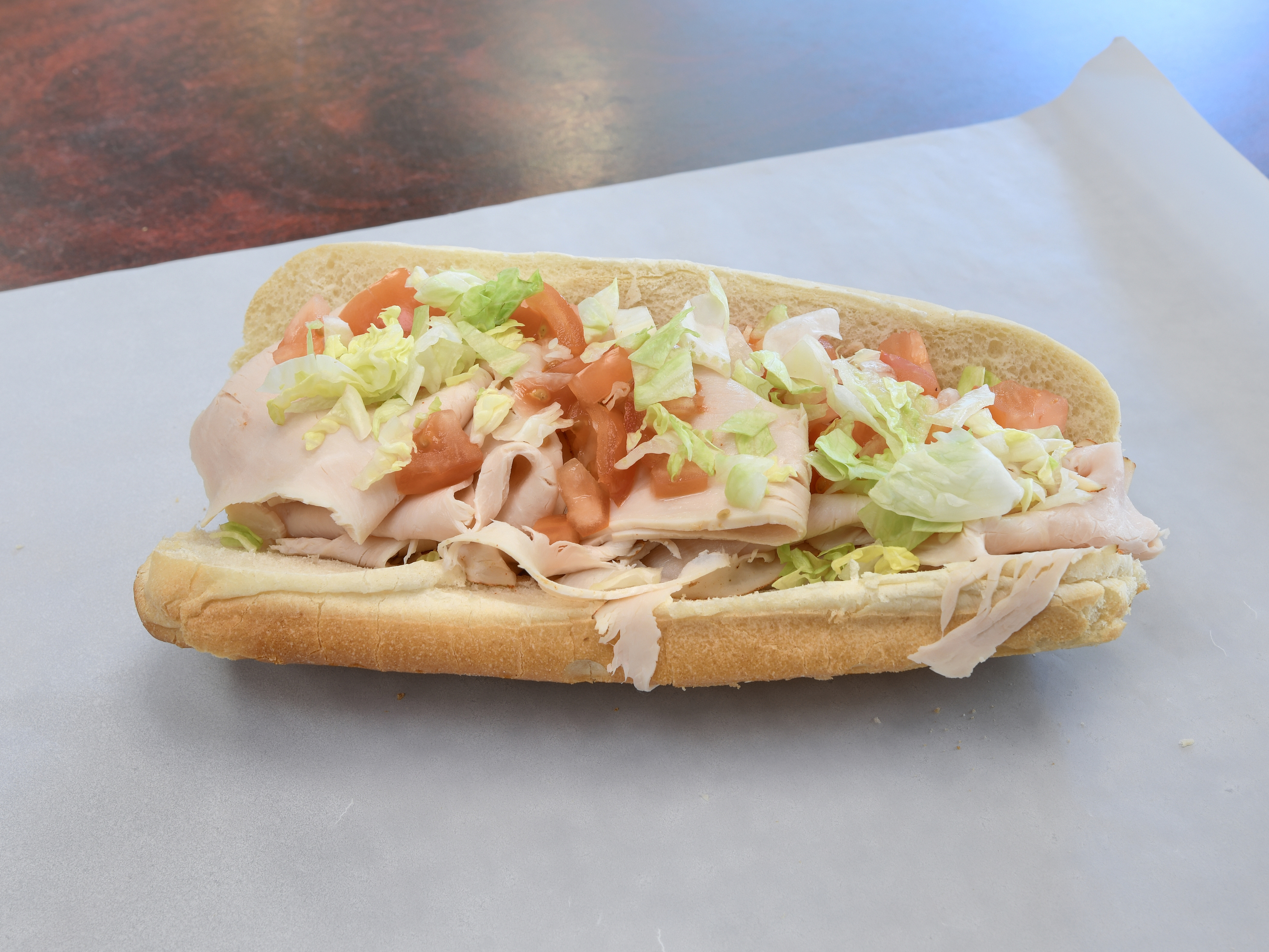 Order Turkey Sub food online from Homestead Grocery & Deli store, Amherst on bringmethat.com