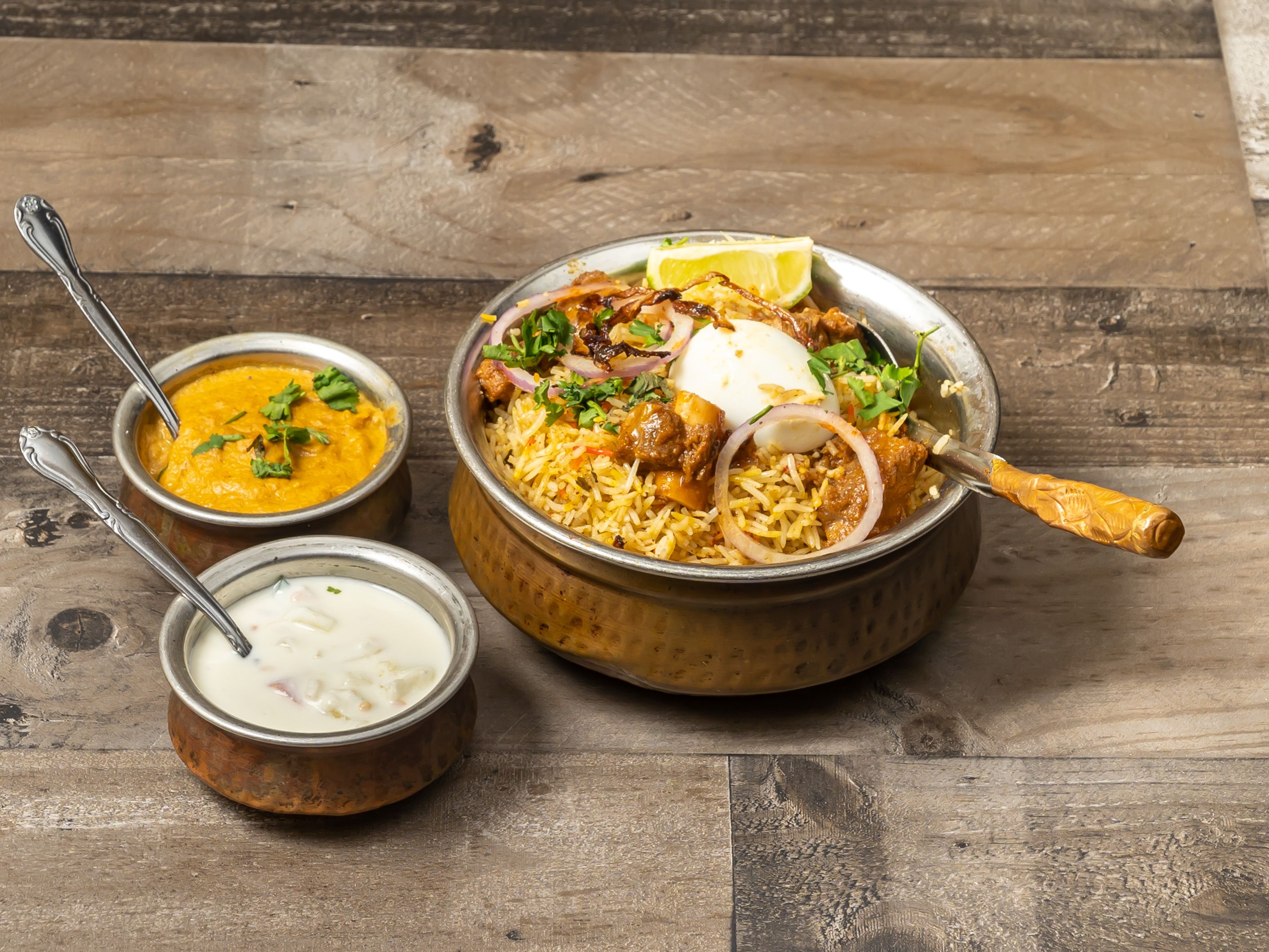Order Goat Biriyani food online from Masala Indian Kitchen store, Dallas on bringmethat.com