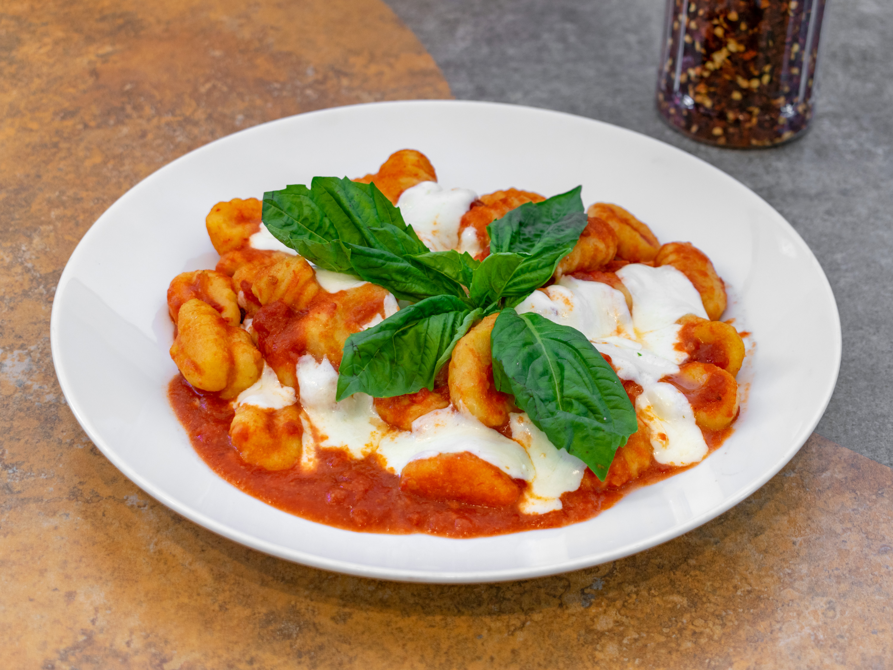 Order Gnocchi With Tomato Sauce and Fresh Basil. food online from Pizzeria Hoboken store, Hoboken on bringmethat.com