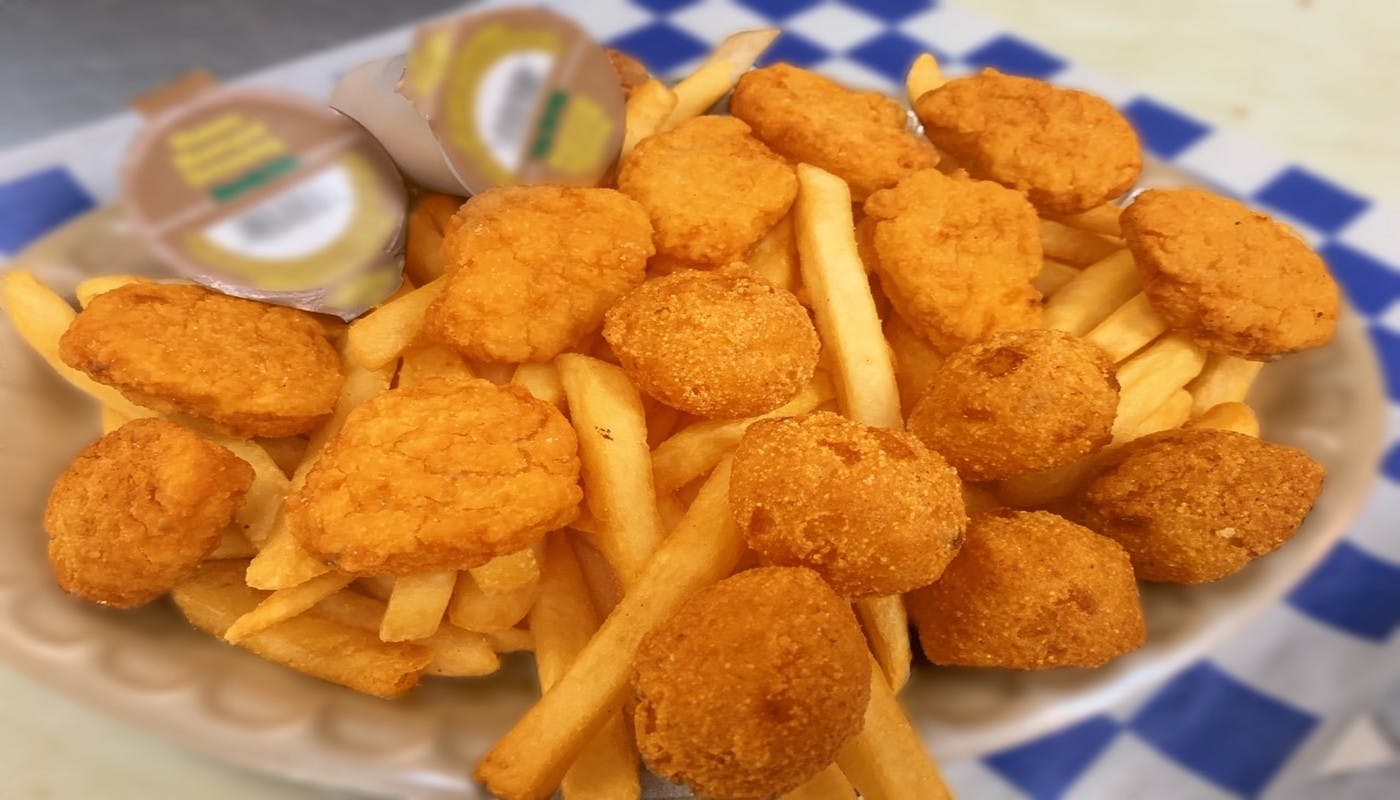 Order Chicken Nuggets Dinner - 7 Pieces food online from Village Pizza & Seafood store, Texas City on bringmethat.com