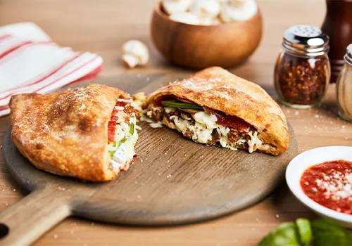 Order Johnny’s Italian Special Calzone food online from Johnny's New York Style Pizza store, Dallas on bringmethat.com