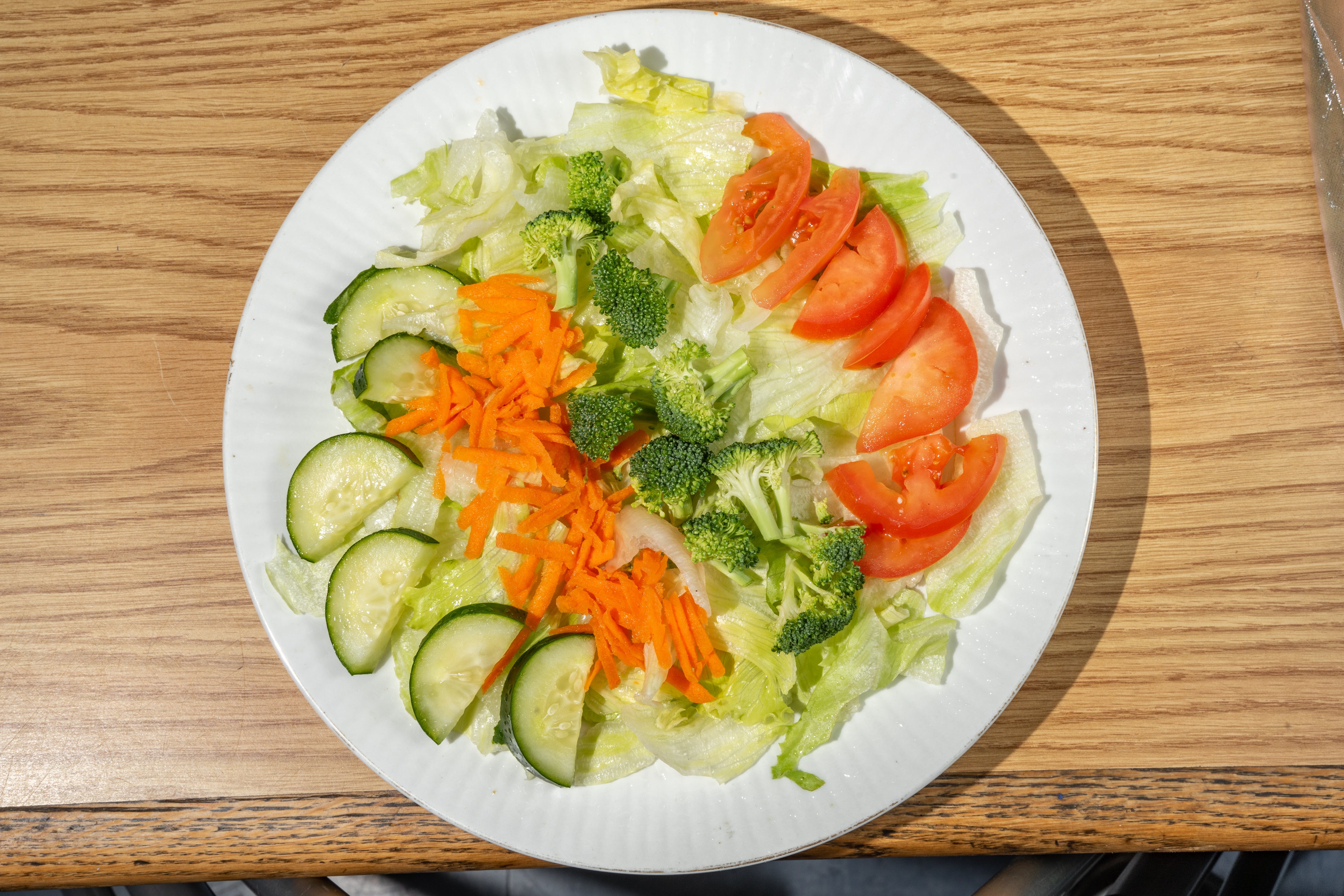 Order Garden Salad - Small food online from Rockyanos Pizza store, Dallas on bringmethat.com