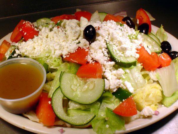 Order Greek Salad food online from Rockets Cafe store, Toledo on bringmethat.com