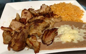 Order 98. Carnitas Dinner food online from La Tolteca store, Williamsburg on bringmethat.com