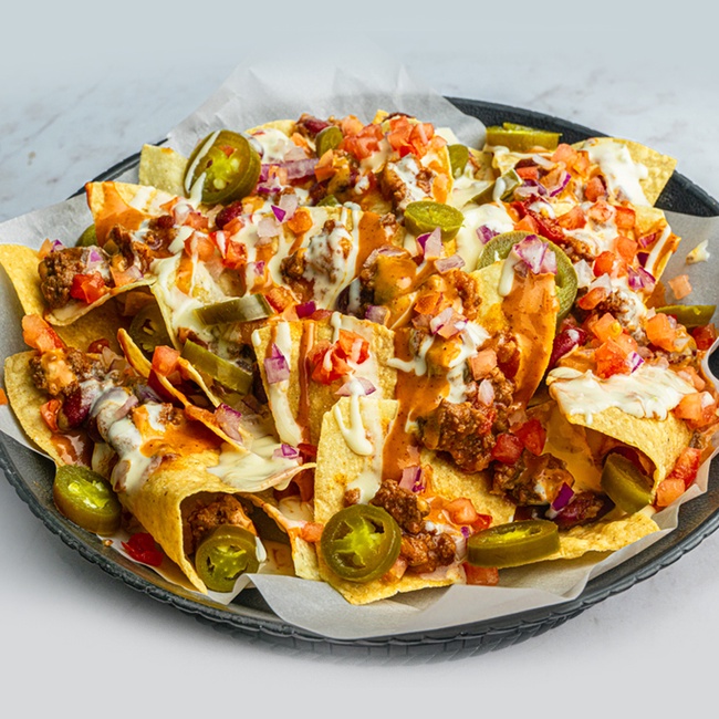 Order Nachos food online from Hurricane Grill And Wings store, Round Rock on bringmethat.com