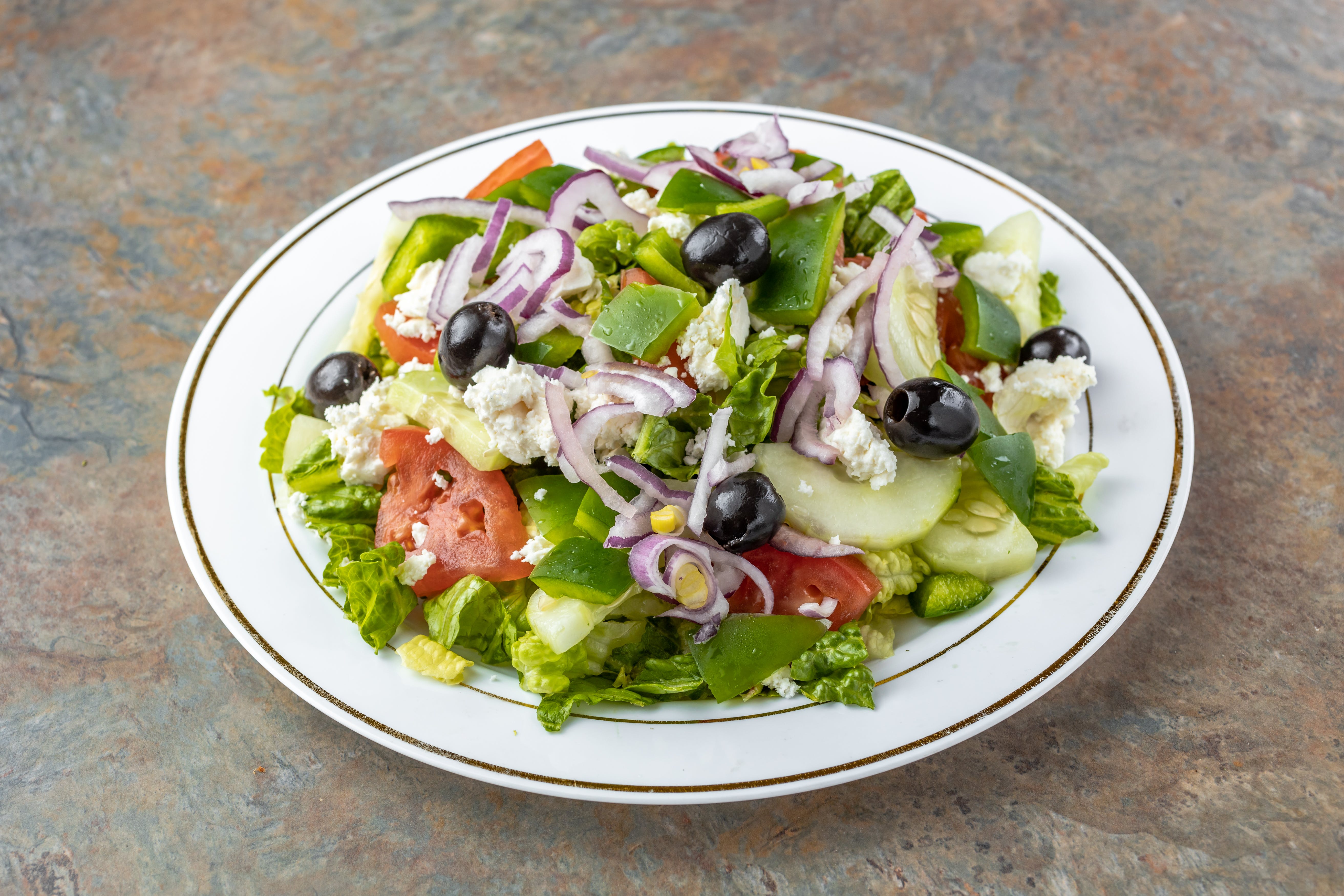 Order Greek Salad - Small food online from Gigi's pizza store, Whitestone on bringmethat.com