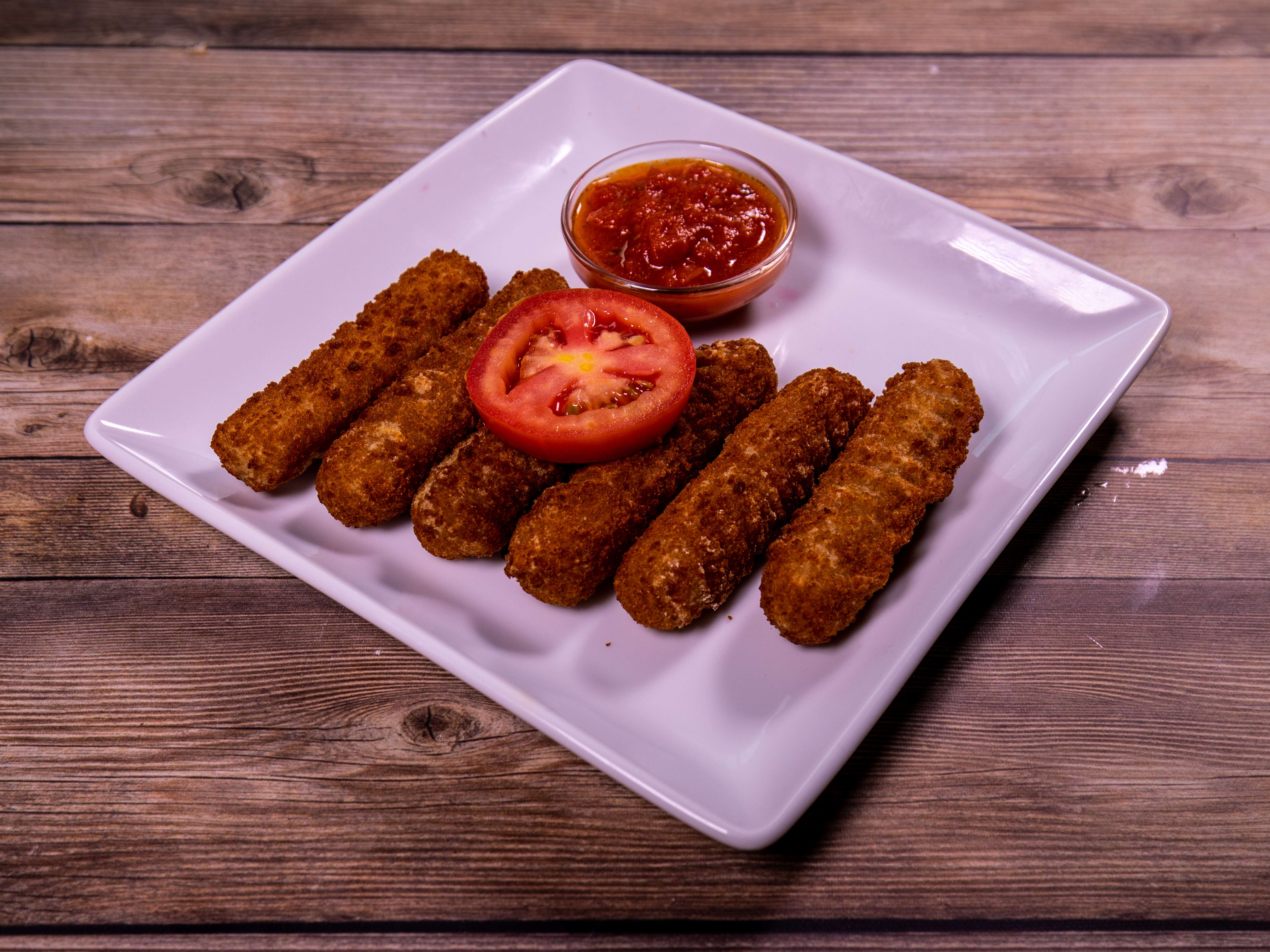 Order 6 Pieces Mozzarella Sticks food online from Roma Pizza store, League City on bringmethat.com