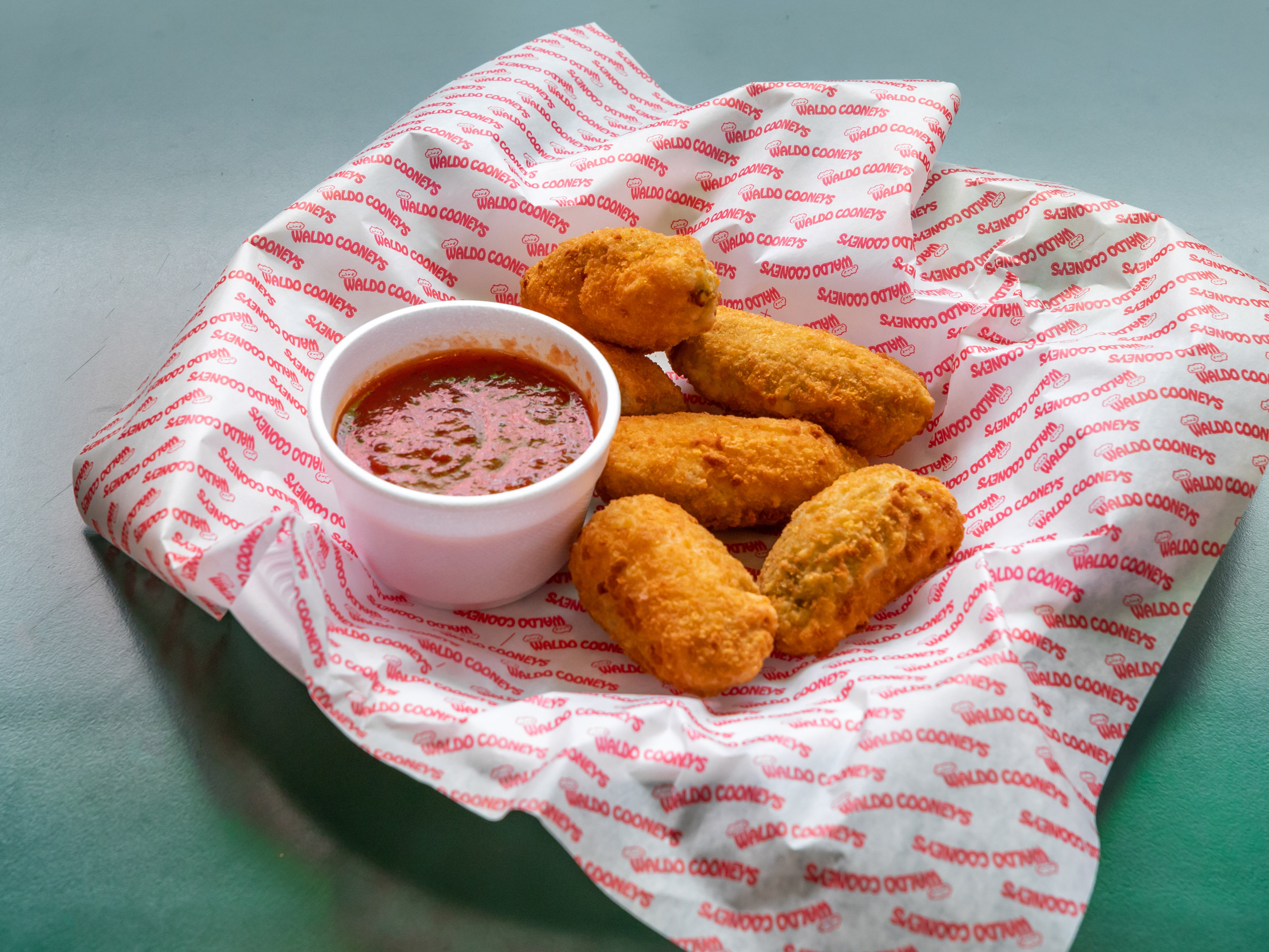 Order Jalapeno Poppers food online from Waldo Cooney's Pizza store, Worth on bringmethat.com