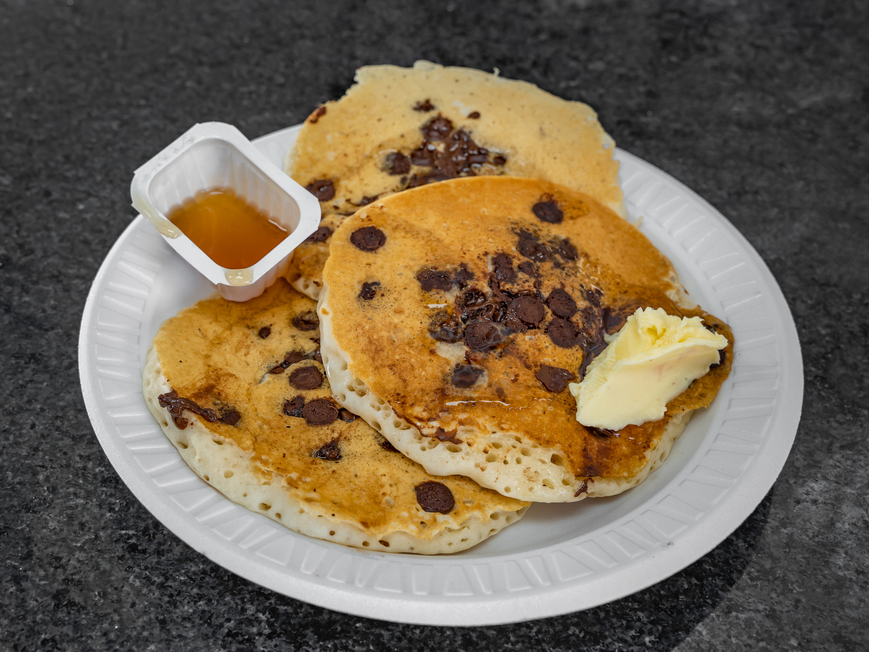 Order 4 Chocolate Chip Pancakes  food online from La Bagel store, Edison on bringmethat.com