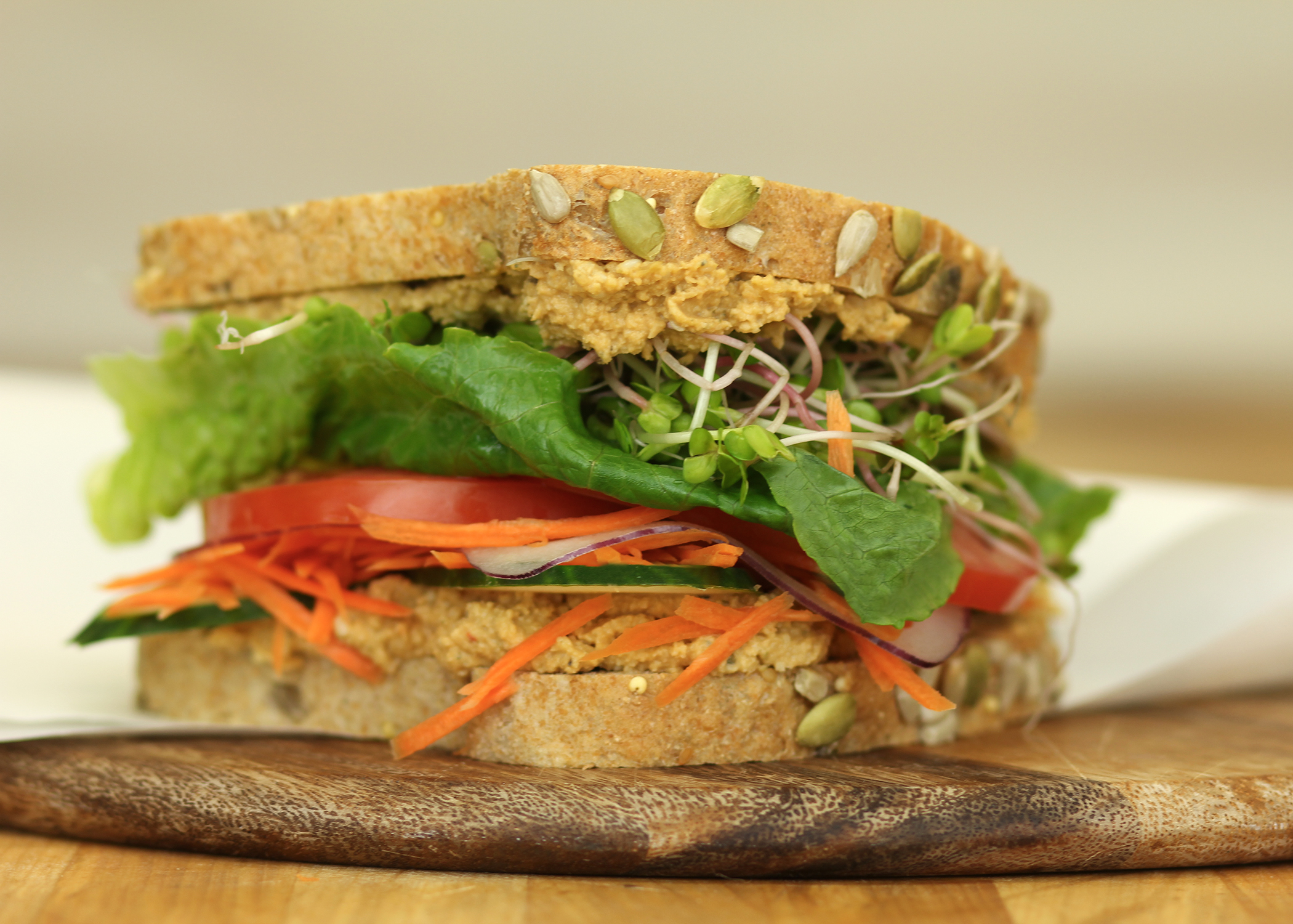 Order Veggie 3-Seed Hummus Sandwich food online from Great Harvest Bread Company store, Mentor on bringmethat.com