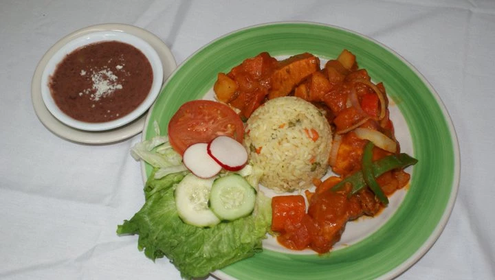 Order Guisado de Puerco food online from El Salvador Restaurant store, Baltimore on bringmethat.com