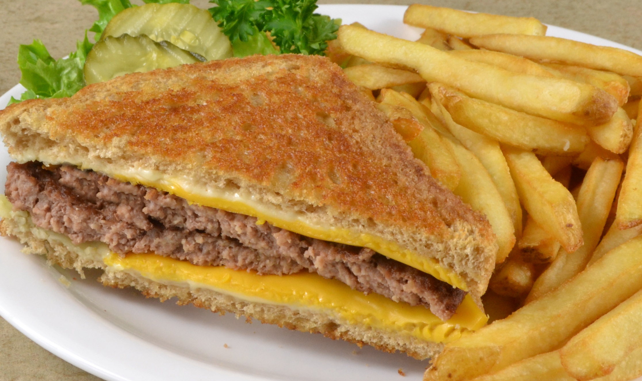 Order Seniors 1/2 Patty Melt Combo food online from Fryn’ Pan store, Sioux Falls on bringmethat.com
