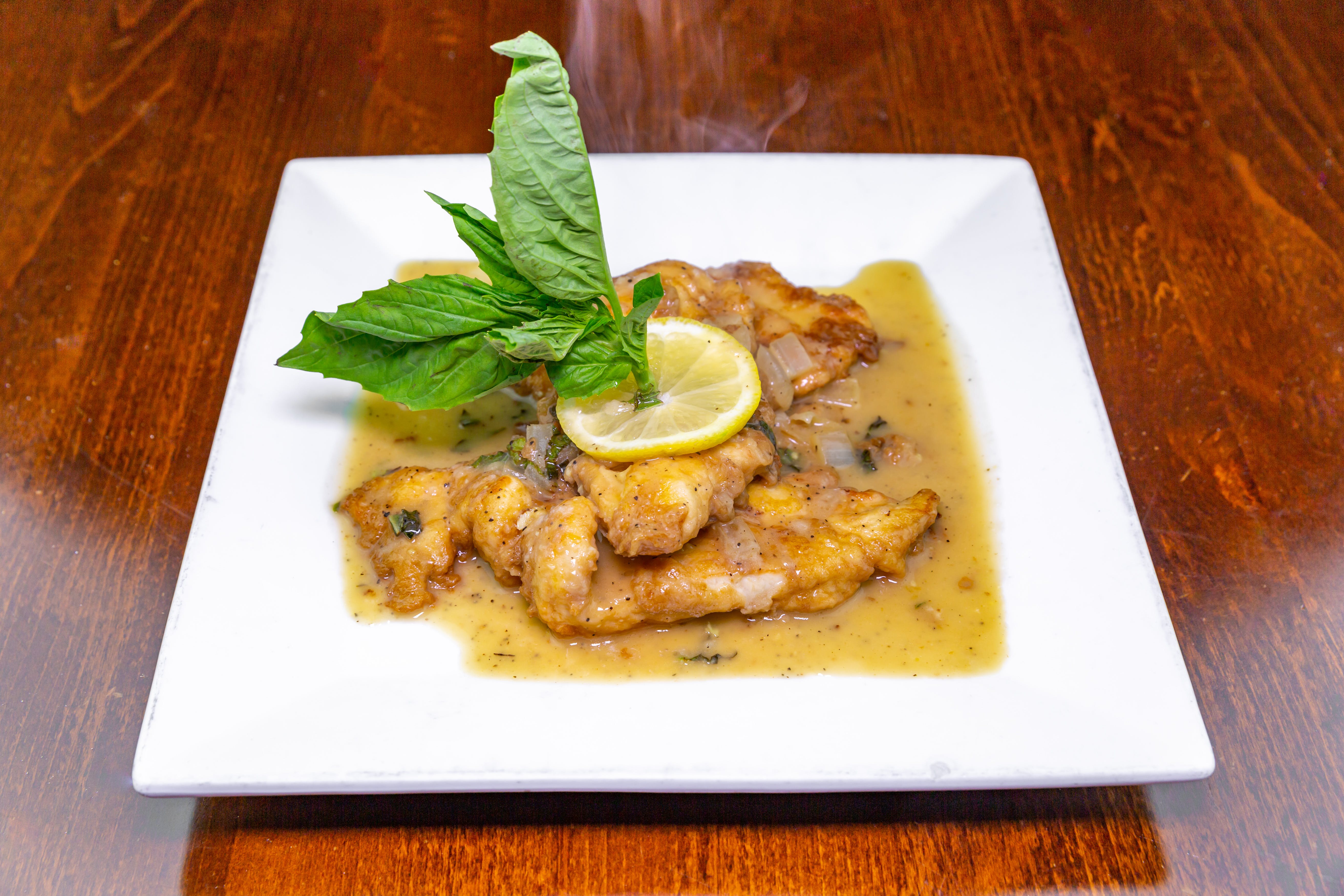 Order Chicken Francese - Entree food online from Zio's Pizza store, Allentown on bringmethat.com