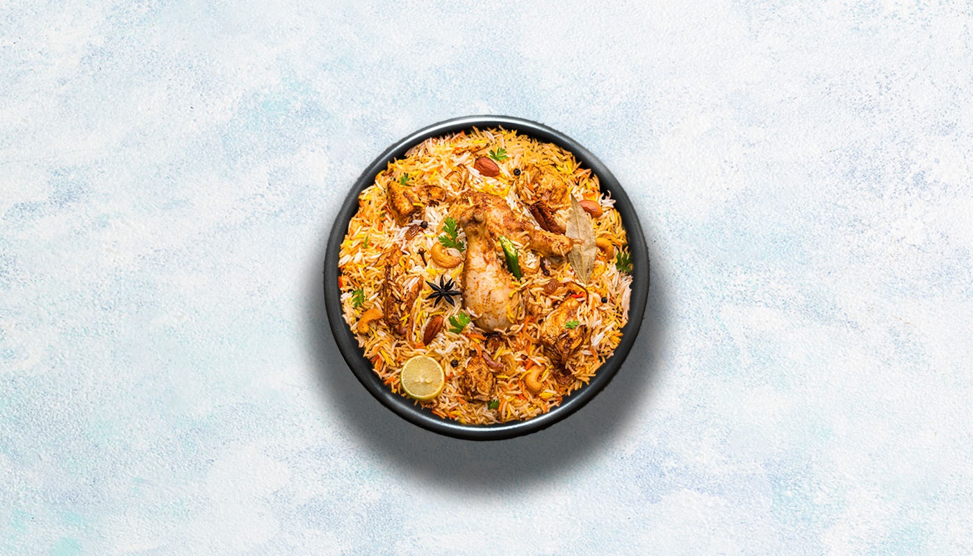 Order Blazin' Chicken Biryani food online from Curry Spoon store, Irving on bringmethat.com