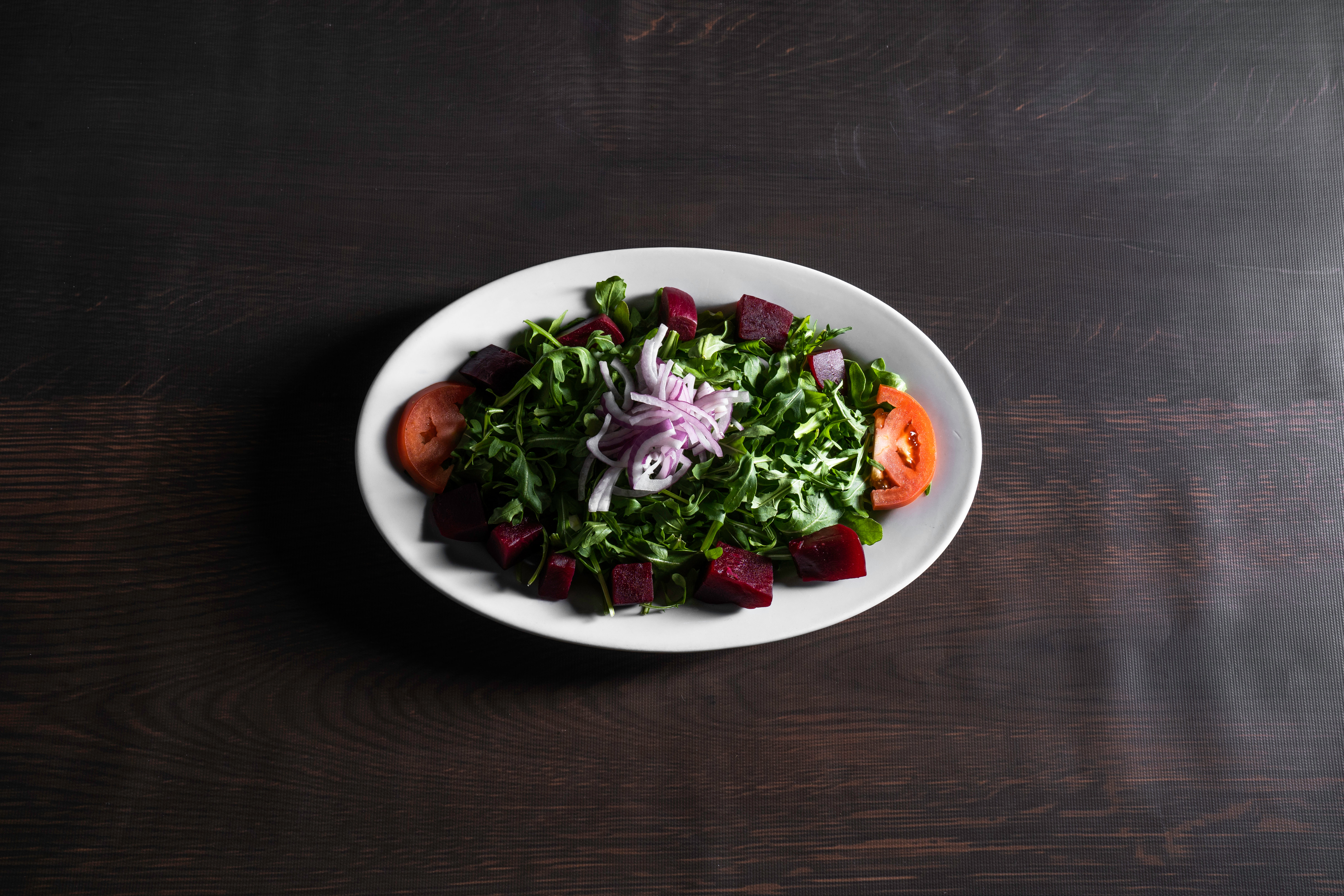 Order Arugula with Beets Salad food online from Kamils Lebanese Cuisine store, Clifton on bringmethat.com