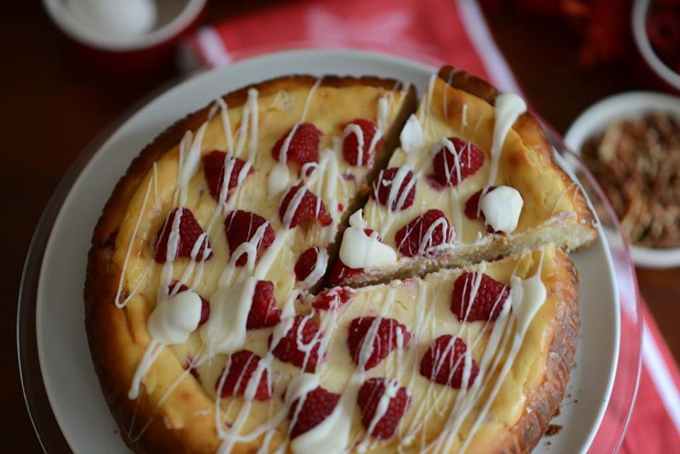 Order White Chocolate Raspberry Cheesecake food online from Red Top Bakery store, Spring on bringmethat.com
