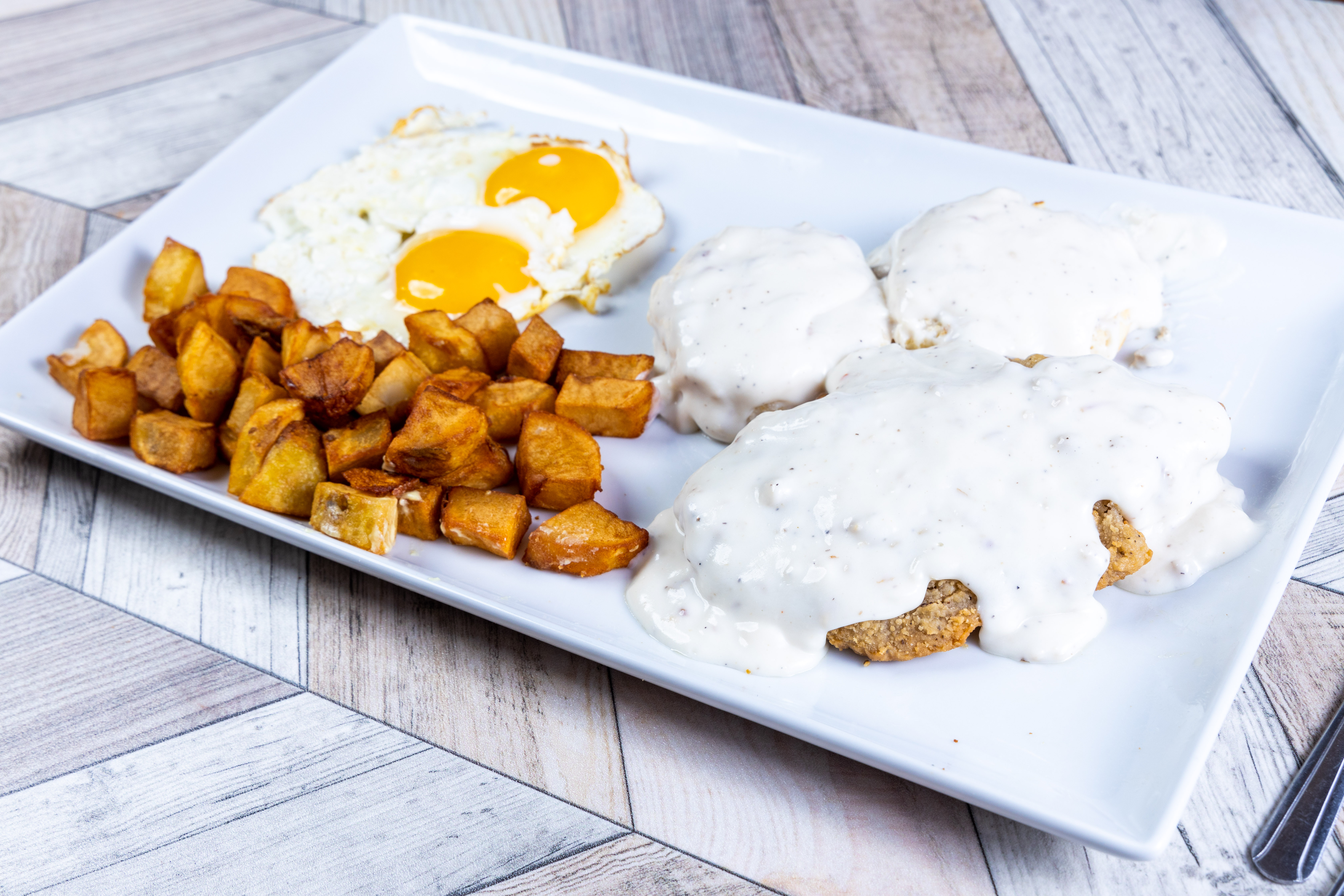 Order Country Fried Steak & Eggs food online from Top View Restaurant store, Chicago on bringmethat.com