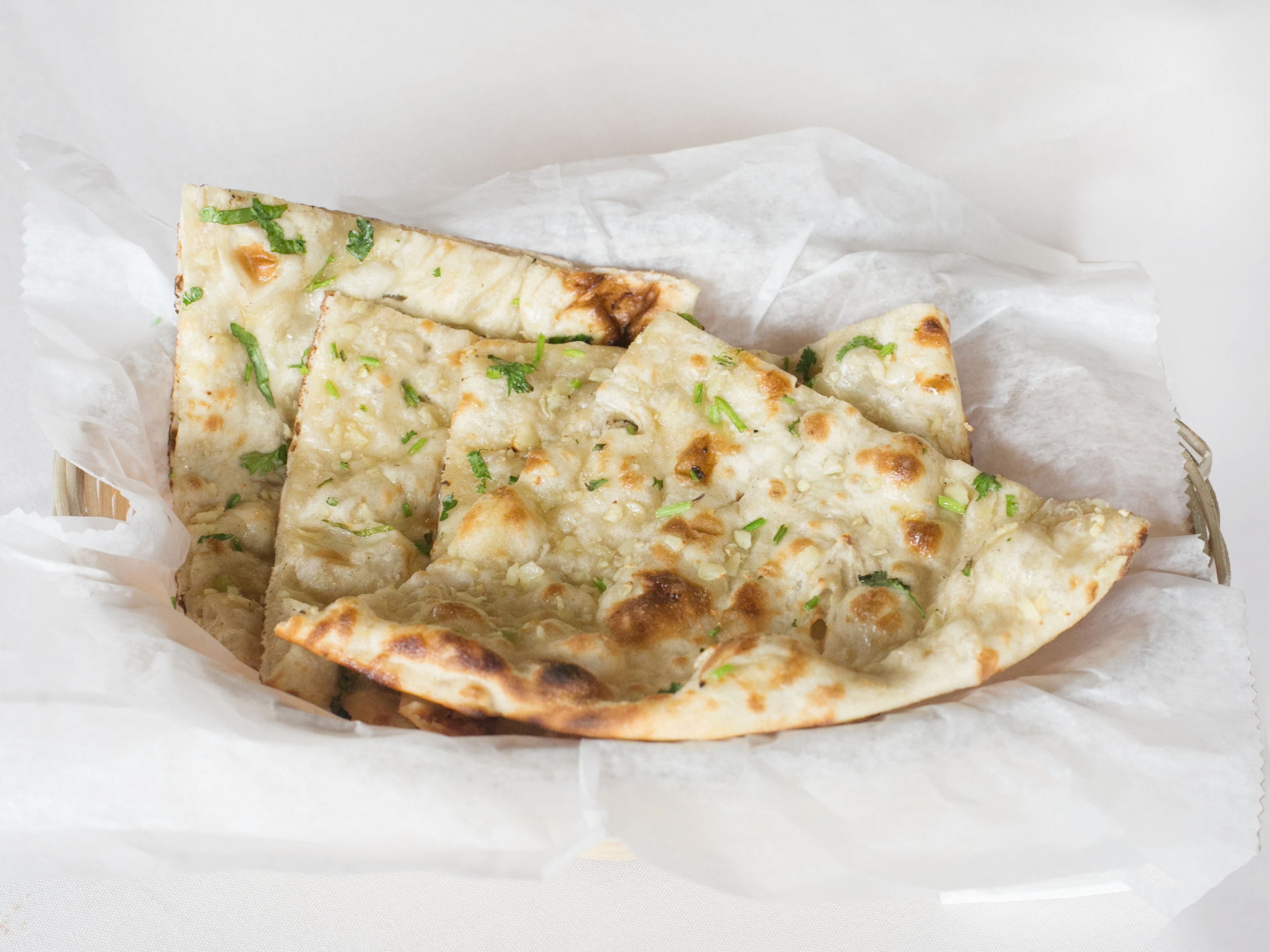 Order Garlic Naan food online from Zaika Indian Cuisine store, North Haven on bringmethat.com