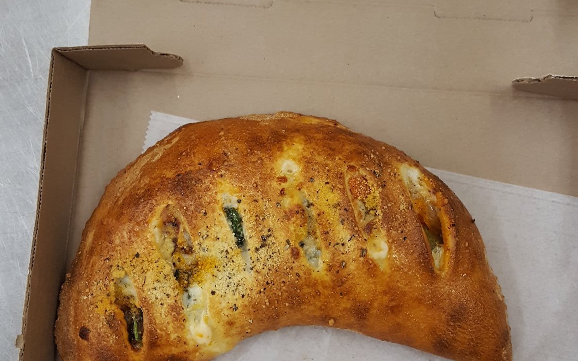 Order Spinach Calzone food online from Sorrento Pizzeria and Grill store, Philadelphia on bringmethat.com