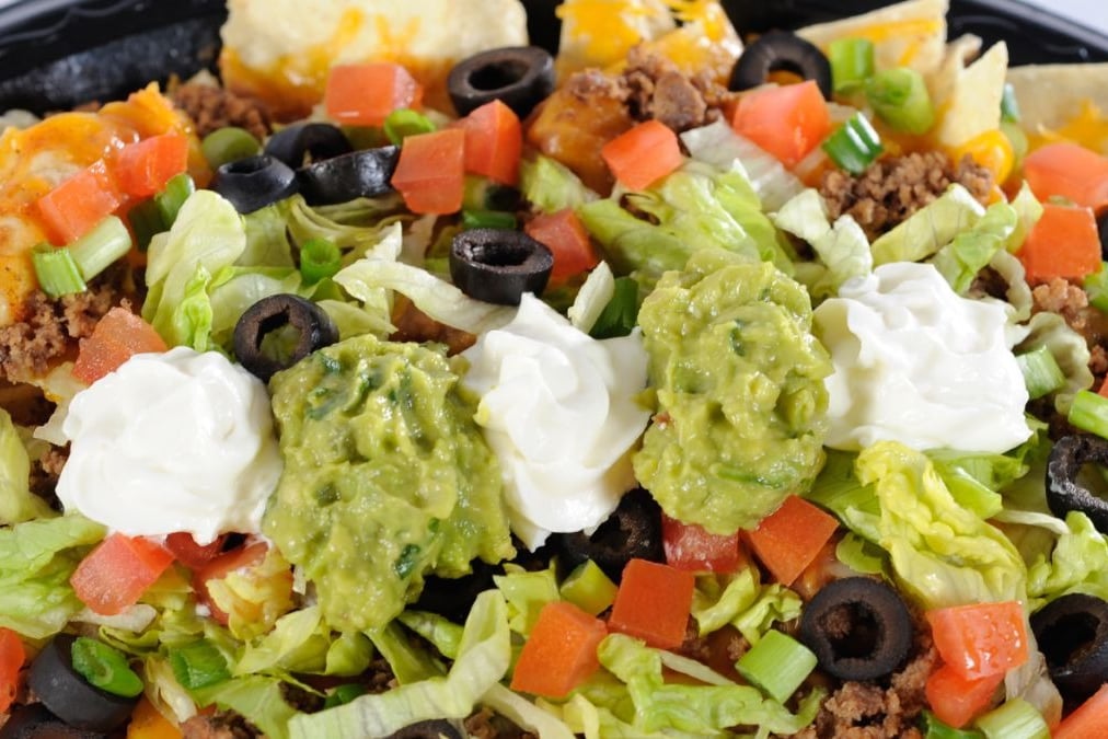 Order Nacho food online from Amigos / Kings Classic store, Lincoln on bringmethat.com