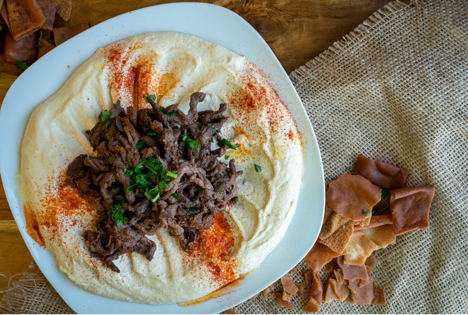 Order Hummus with Meat Shawarma  food online from The Butcher Grille store, Dearborn on bringmethat.com