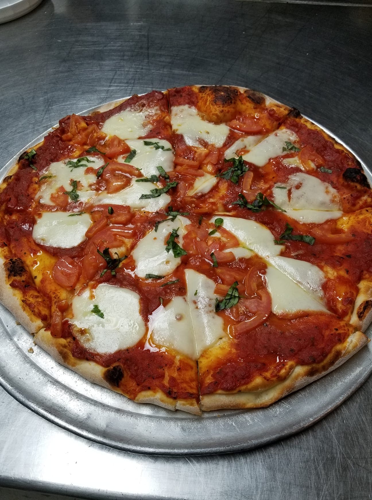 Order Margherita Pizza - 10'' food online from Manzellas Italian Patio store, Champaign on bringmethat.com