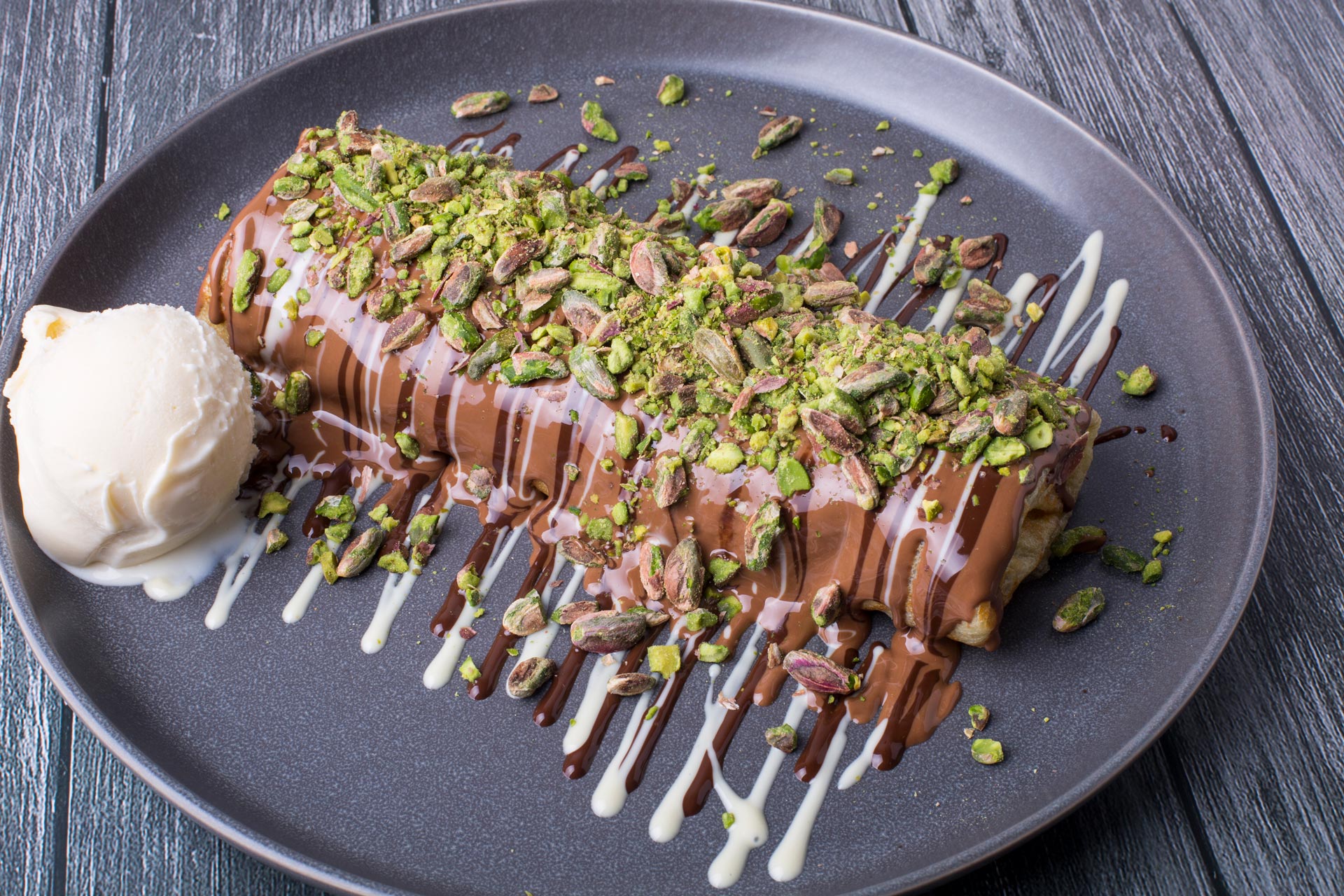 Order Pistachio Crepe Roll food online from Leyra Chocolate store, New York on bringmethat.com