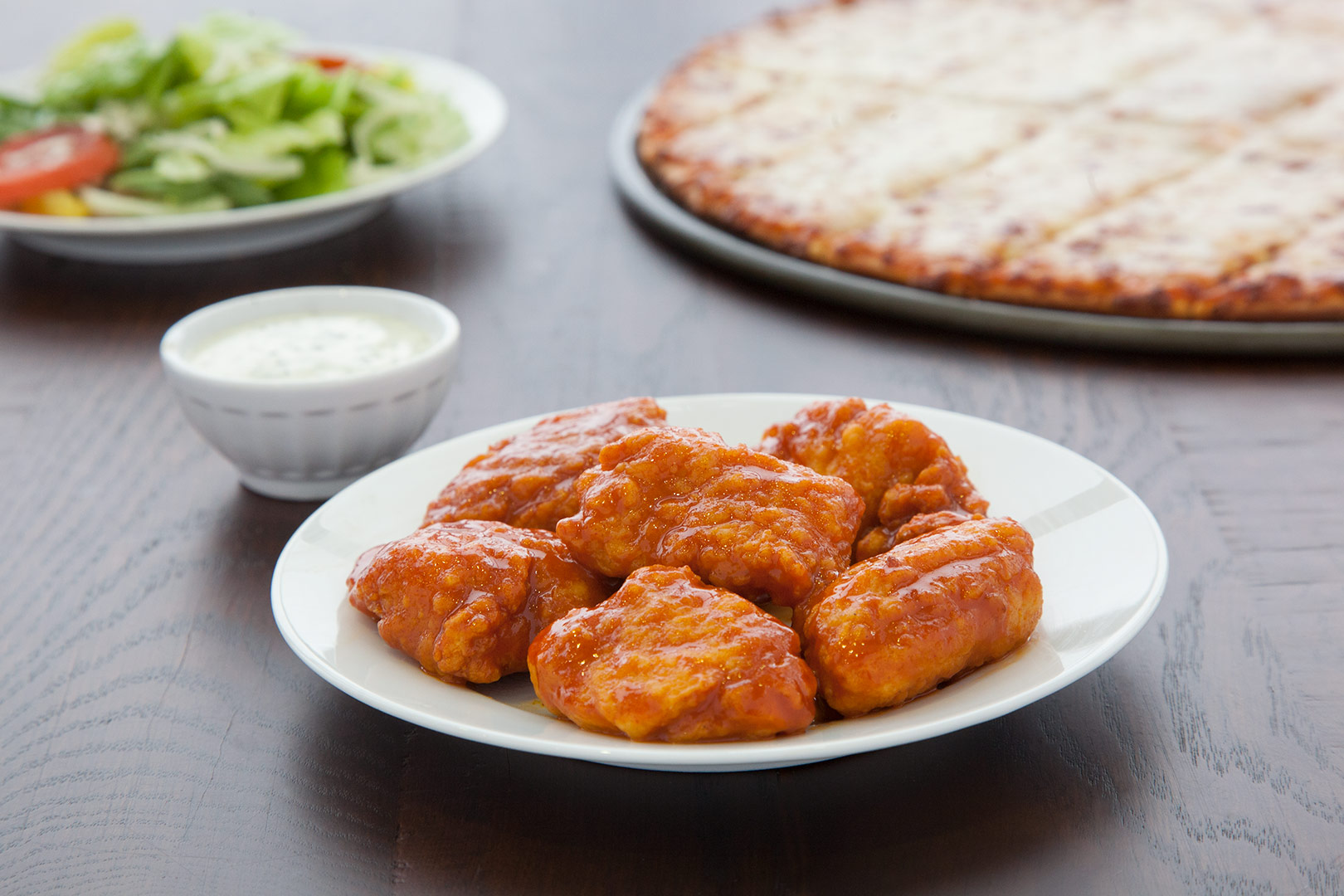 Order Boneless Wings food online from Donatos Pizza store, Bellefontaine on bringmethat.com