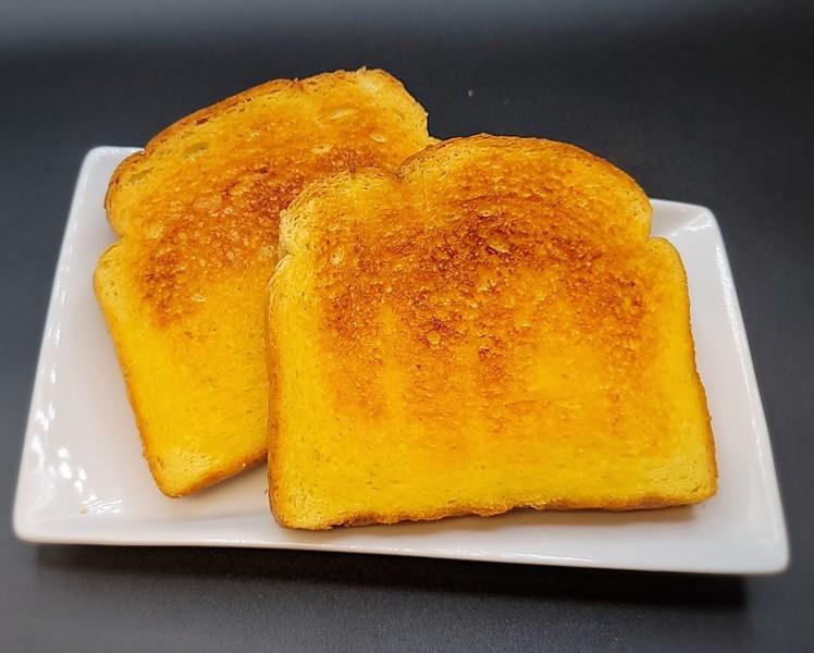 Order Garlic Butter Texas Toast (2 Pcs) # food online from Honey Dress Fried Chicken store, Torrance on bringmethat.com