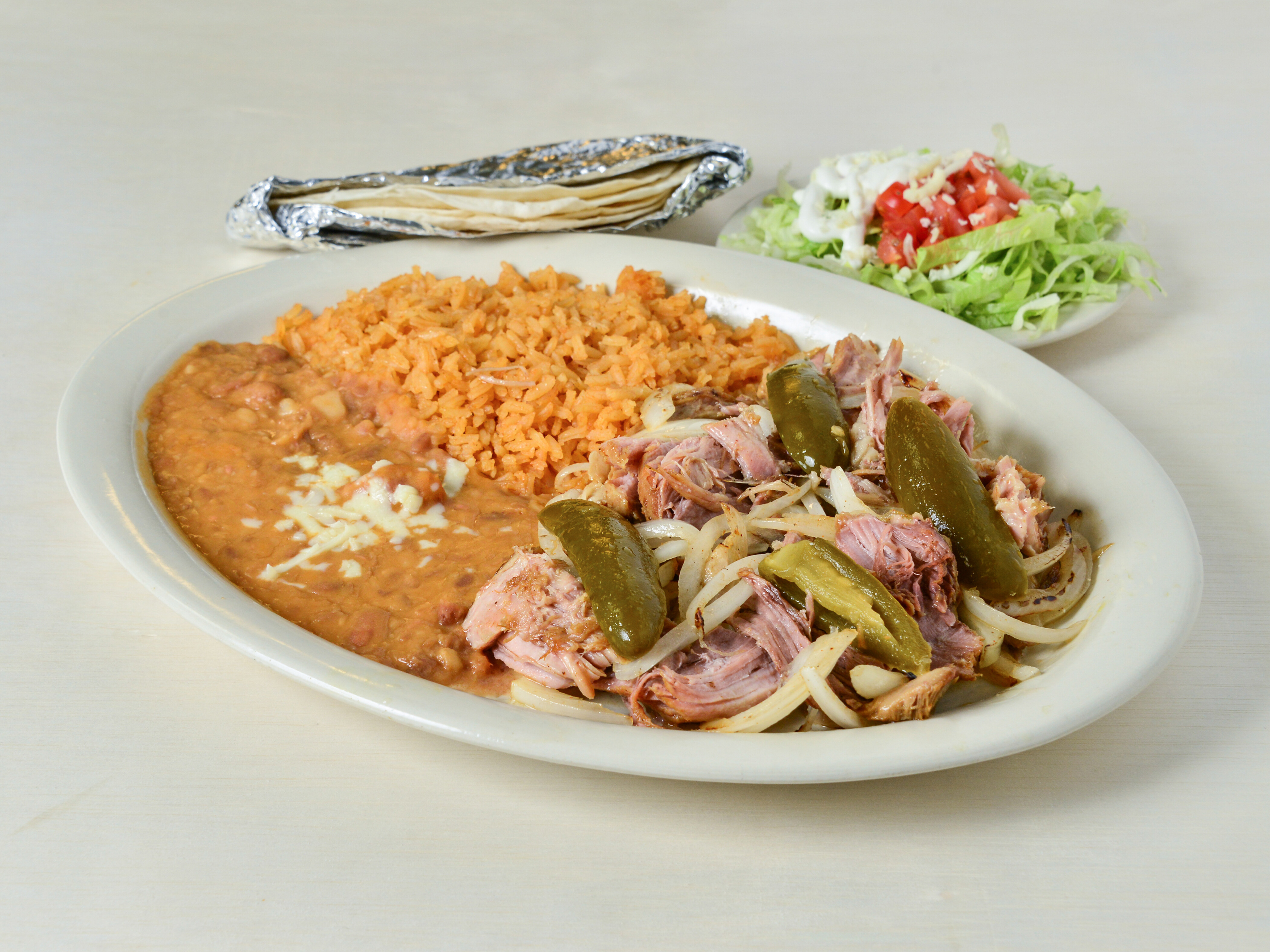 Order Carnitas Mexicanas Dinner food online from Oasis Mexican Grill store, Springdale on bringmethat.com