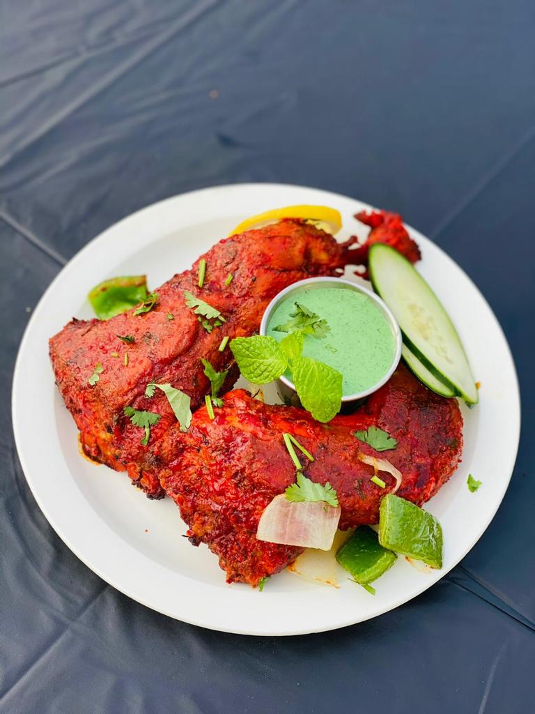 Order 4 Piece Tandoori Chicken food online from Kabobs Indian Grill store, Minneapolis on bringmethat.com