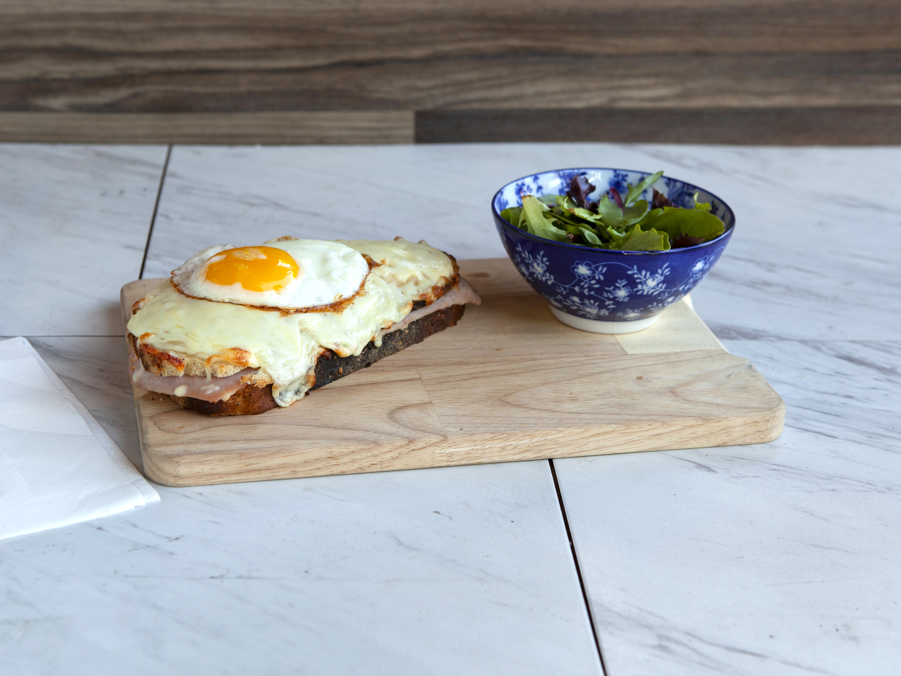 Order CROQUE MADAME (served with green salad) food online from The Place To Be store, Santa Monica on bringmethat.com