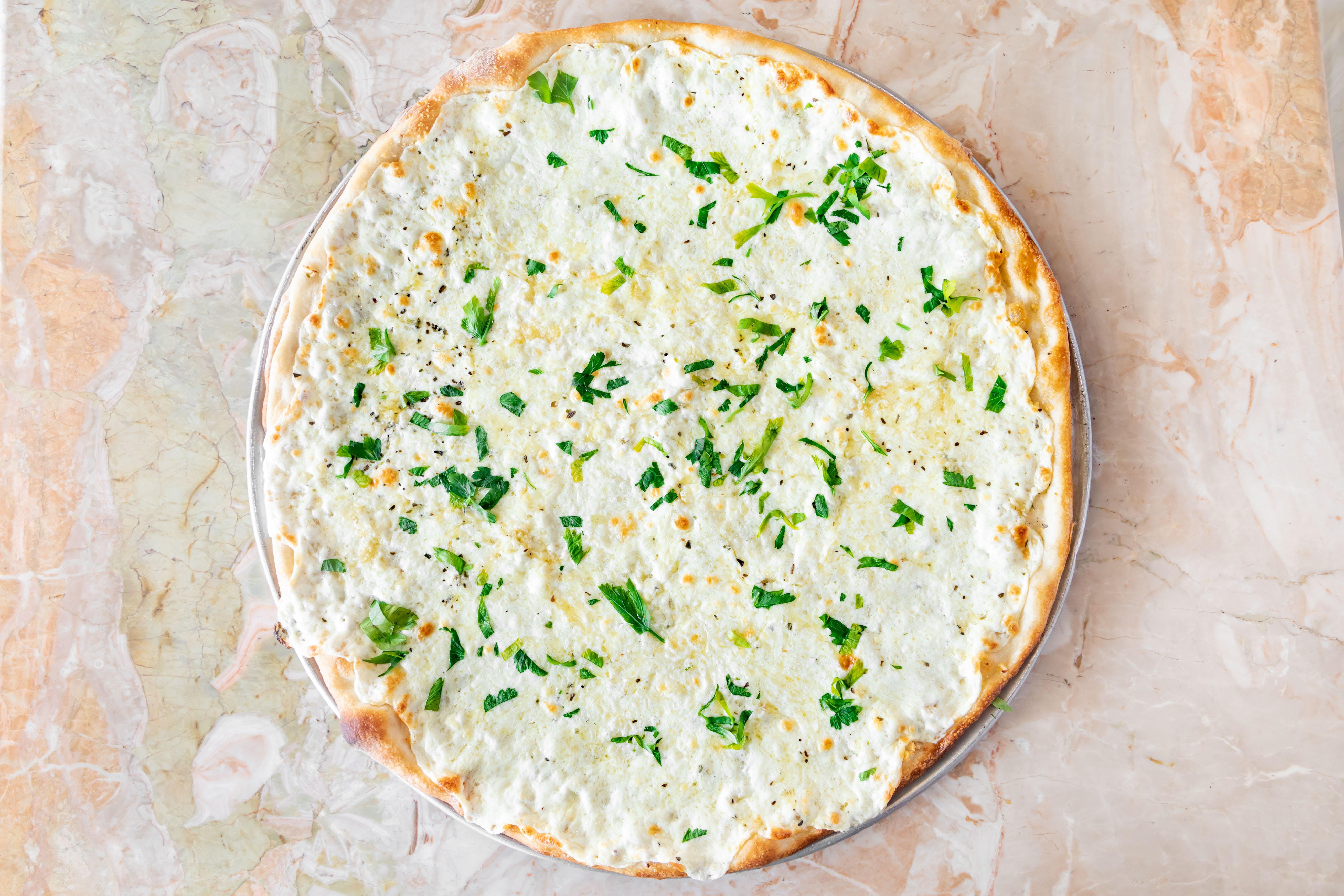 Order White Pie - Small food online from Luna Pizza store, Simsbury on bringmethat.com