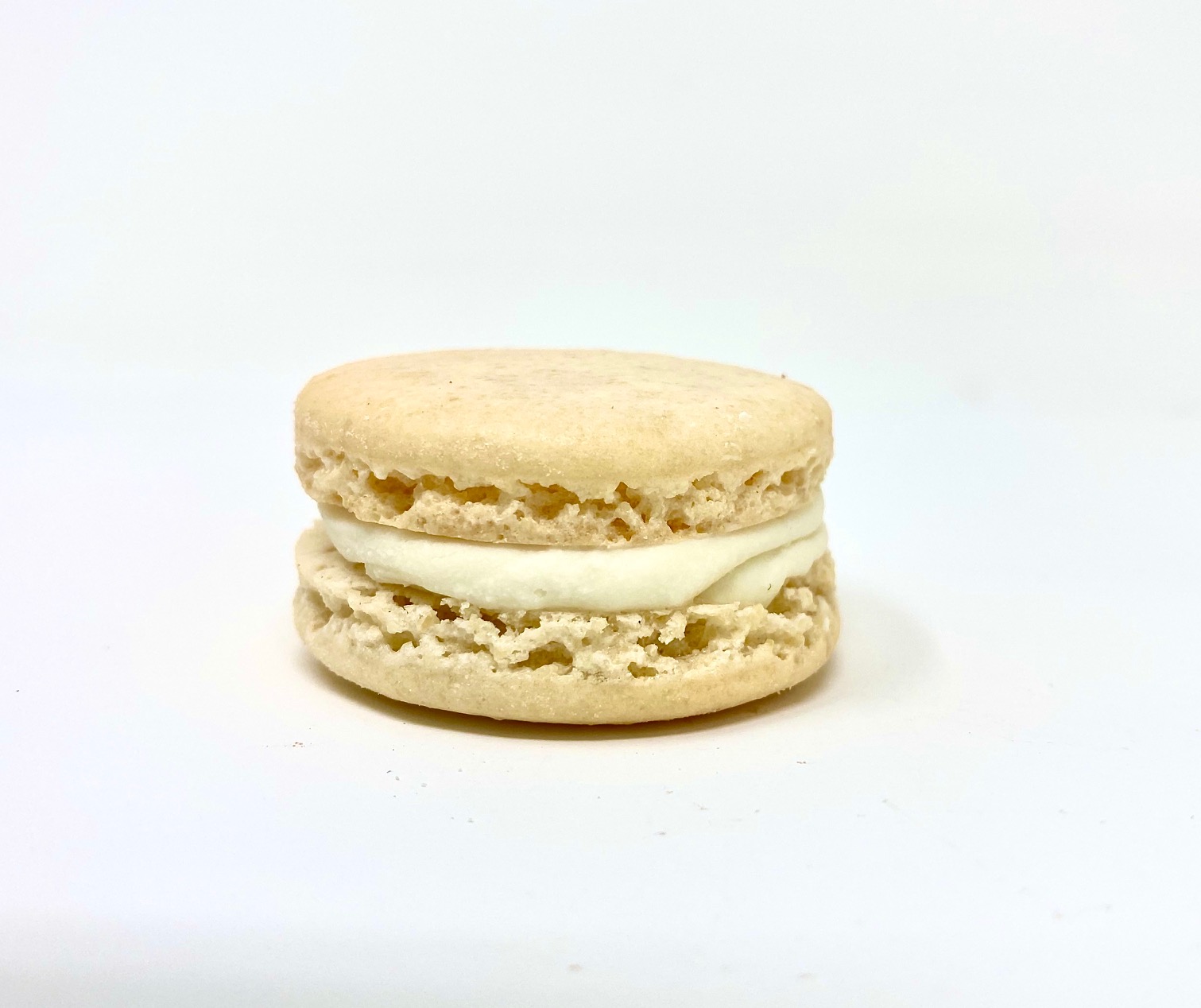 Order Vanilla Bean Macaron food online from Joy And Sweets store, Culver City on bringmethat.com