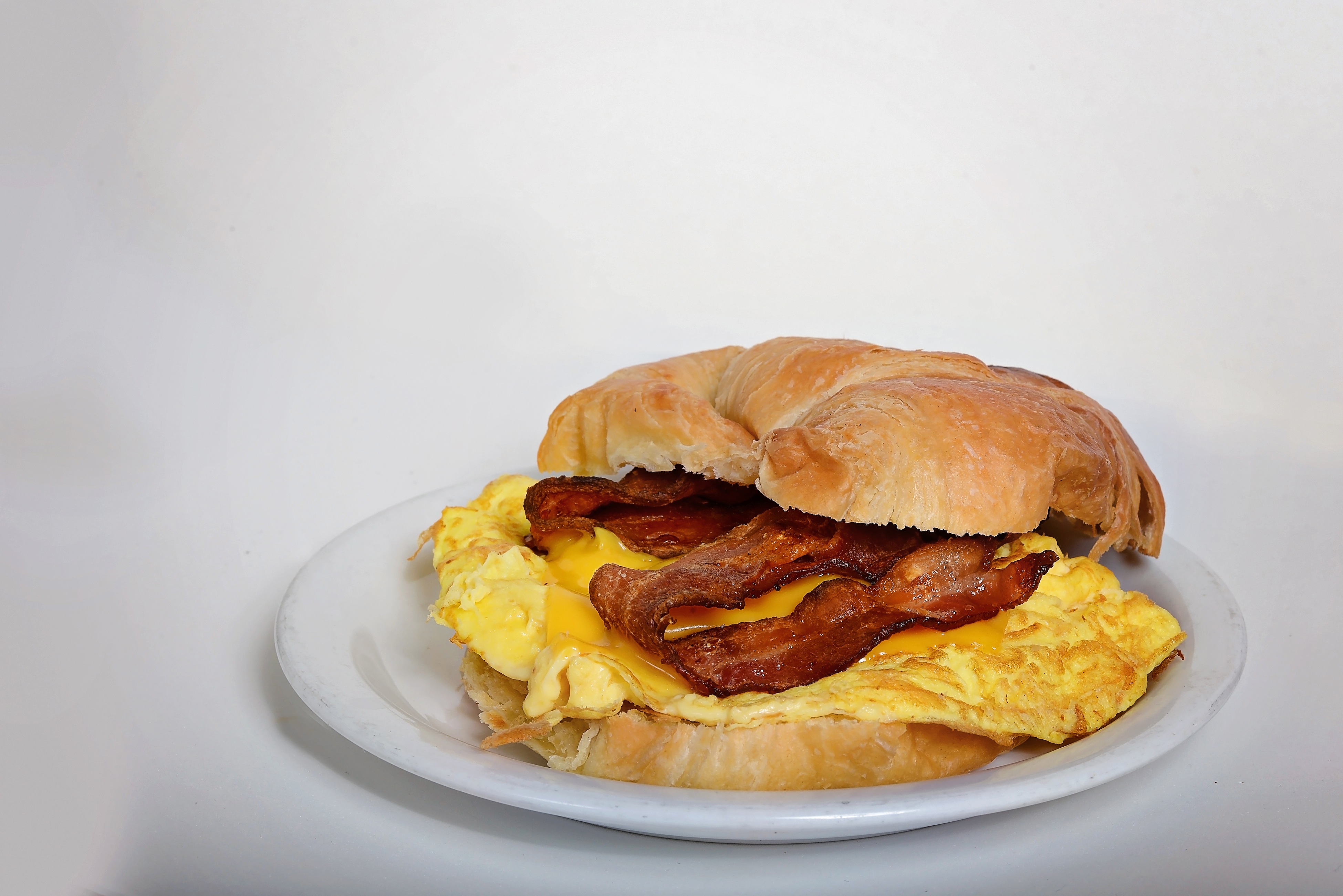 Order Bacon, Egg and Cheese Sandwich food online from Espression Cafe store, Las Vegas on bringmethat.com