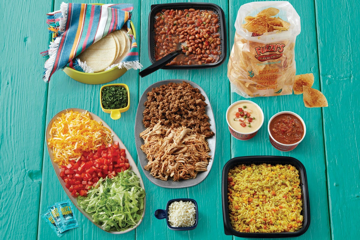 Order Regular Taco Family Meal - Serves 4-6 food online from Fuzzy Taco Shop store, Wichita on bringmethat.com