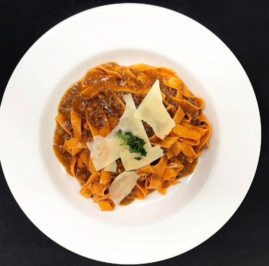 Order Pappardelle Bolognese food online from Cucina Alessa store, Newport Beach on bringmethat.com